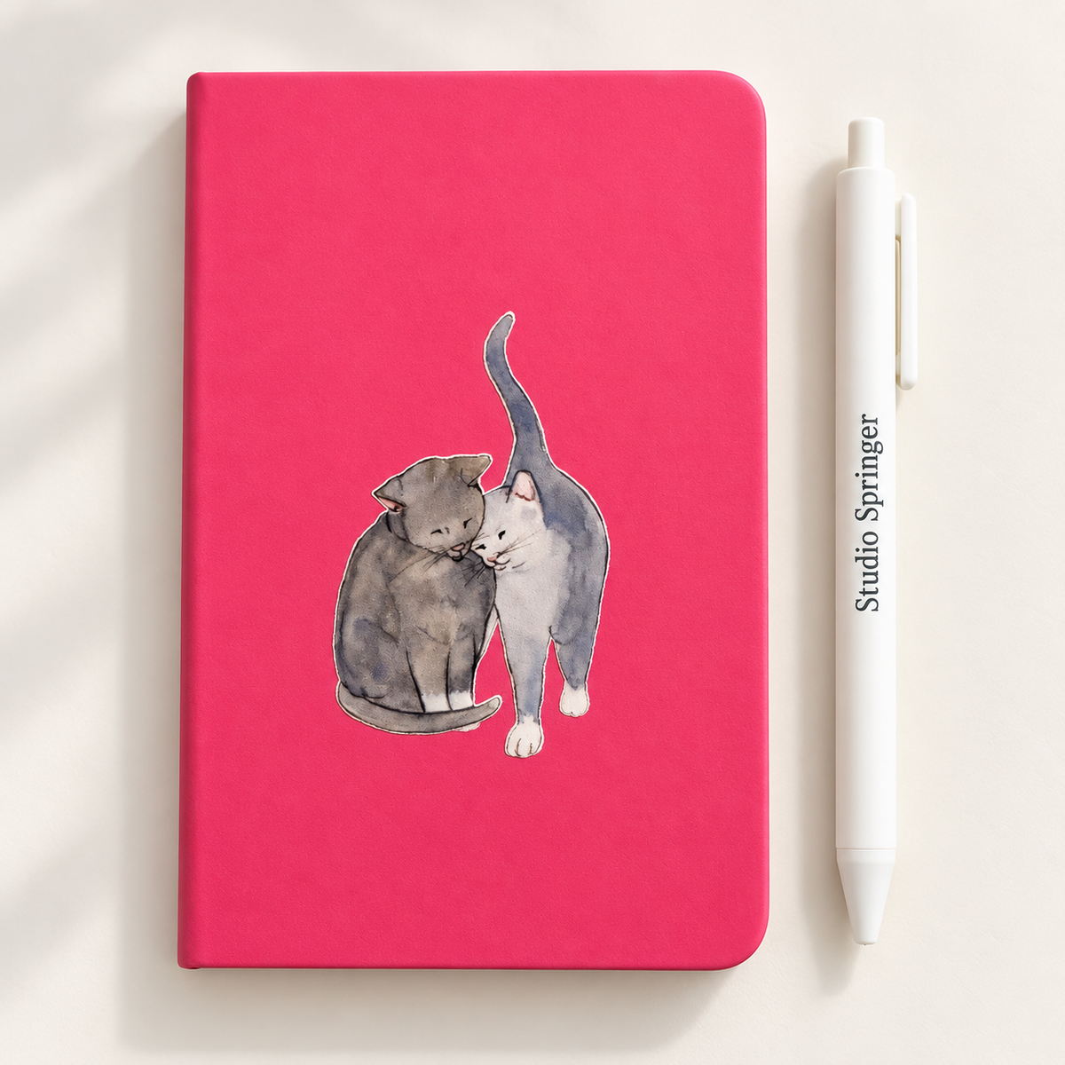 roze notitieboekje A6, met blauw katten paar, gelinieerde pagina's, / studio springer