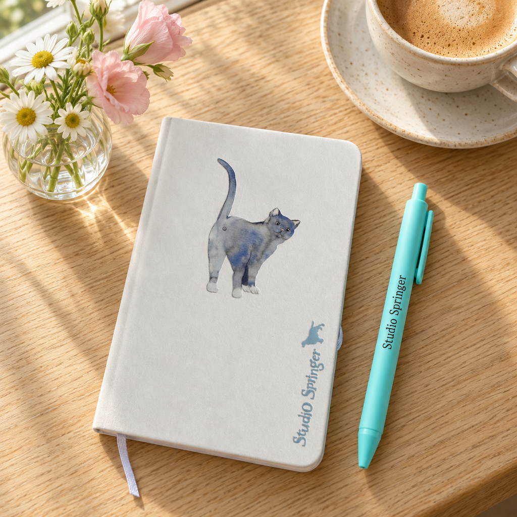 wit notitieboekje A6, met blauwe kat, gelinieerde pagina's, / studio springer