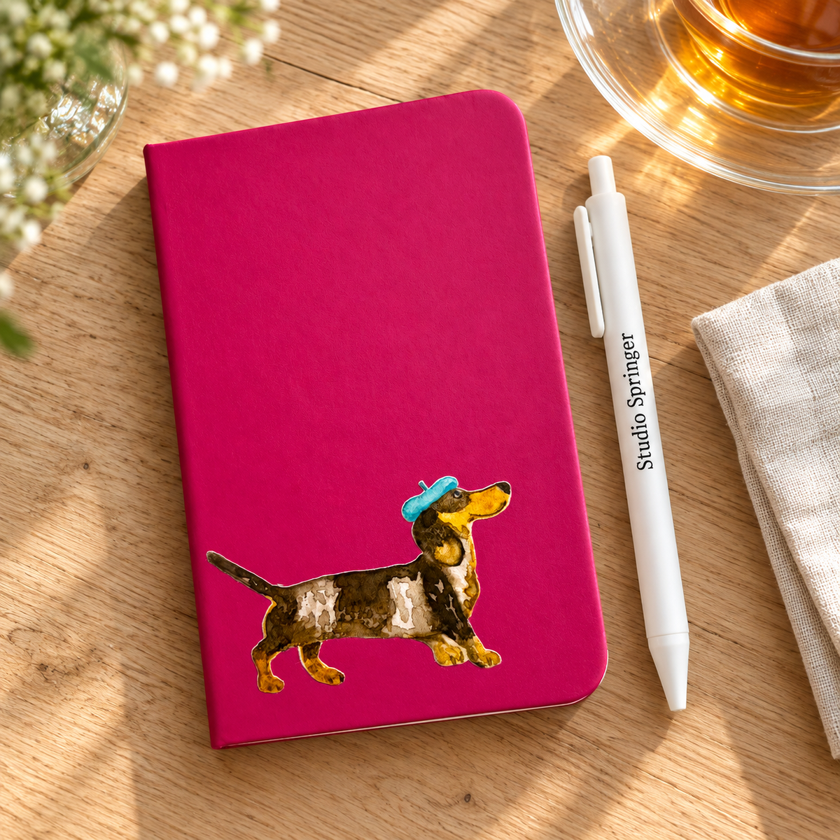 A6-notitieboek met teckel / dachshund en alpinopet - fuchsia